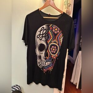 Black Graphic T-Shirt with split design skull by Ay Guey